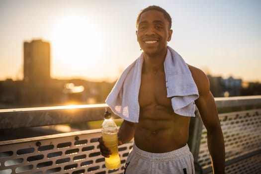 Portrait of young happy a man who is ready for exercising and jogging.