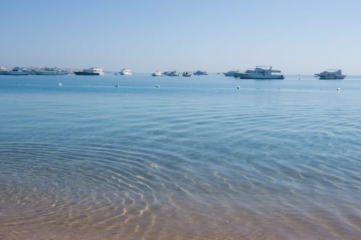 Beach Relaxation at the Red Sea. Fairy-tale Moments of a Sunny Day. The concept of tourism and sea travel.