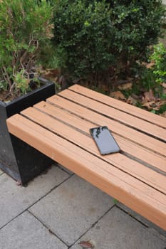 forget smartphone on a park bench, lost smart phone ,