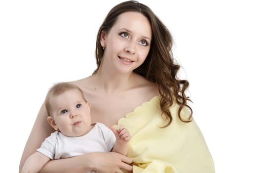 Image of attractive woman and her little daughter posing in studio
