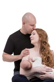 Studio image of happy parents with little child, isolated on white