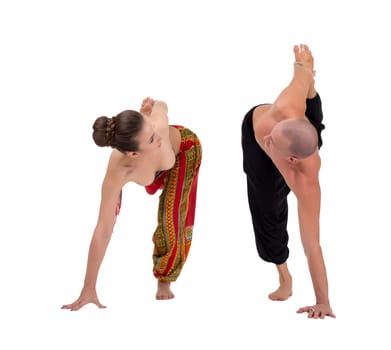 Paired yoga. Man and woman look at each other during exercise