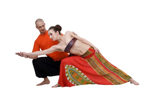 Yoga. Image of professional coach helps woman to perform asana