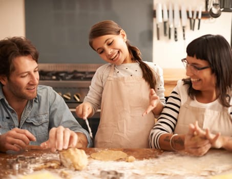 Mother, father and child with baking dough in kitchen with flour, happiness and teaching with support. Family, parents and girl with helping, learning and bonding with cooking for hobby and playing.