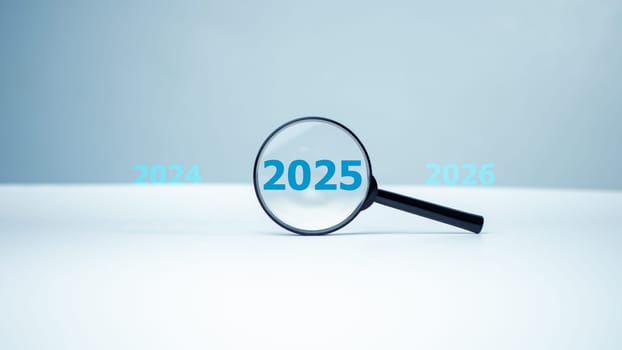 Magnifying glass and text 2025 new year idea concept, 2025 inside of Magnifier glass on white background for focus current situation, Black magnifier glass with 2025 year among 2024 and 2026 for focus