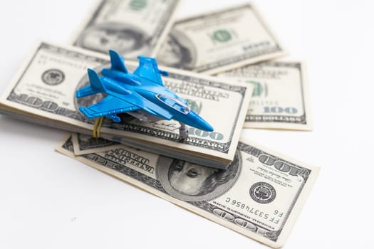 Toy plane and money on background. Travel insurance. High quality photo
