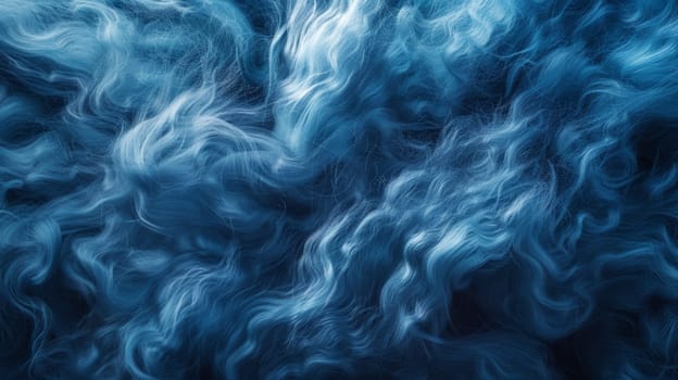 A close up of a blue and white swirl in the air