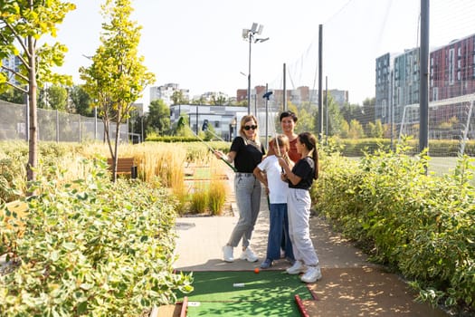 A playground in the park equipped for playing mini-golf. High quality photo