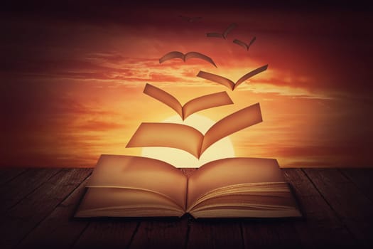 Surreal scene with book pages transforms into magical flying birds, against sunset sky background. Unwritten, blank textbook sheets escapes like poetry thoughts. Knowledge concept, wisdom symbol