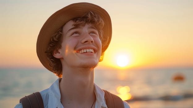 A young man with a hat smiling at the sun