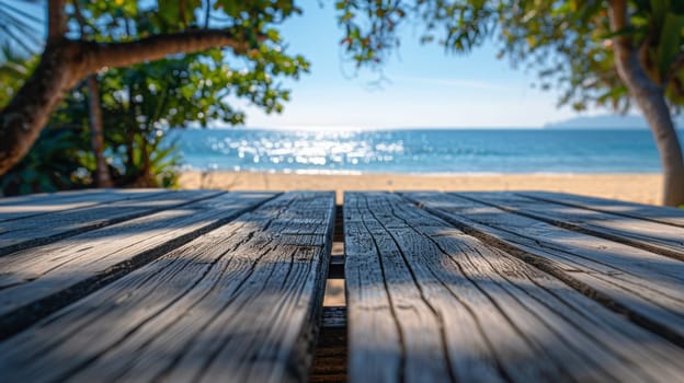 A wooden table with a view of the beach and trees