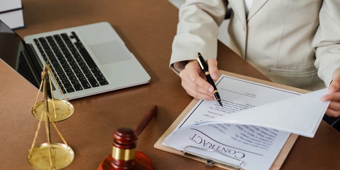 lawyer businessman working or reading lawbook in office workplace for consultant lawyer concept.