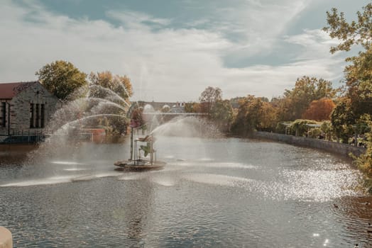 On An Old European City Bietigheim-Bissingen In Germany. the City Park of Bietigheim-Bissingen, Baden-Wuerttemberg, Germany, Europe. Autumn Park and house