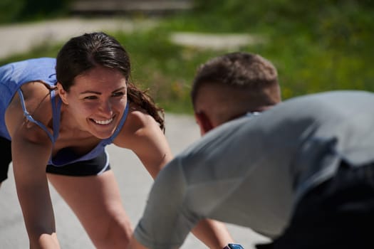 Exercise, mockup and couple workout and stretch together outdoors in nature by a mountain for health, wellness and fitness. People, partners and athletes training and keeping fit and heathy.