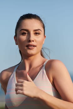 In a captivating close-up shot, an athlete is captured in the midst of intense running, showcasing determination and focus in every stride.