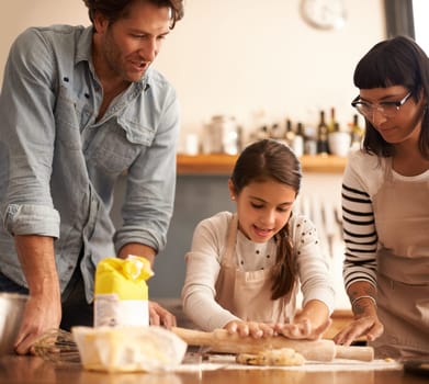 Mother, father and girl with dough for cooking in kitchen with rolling pin, happy and teaching with support. Family, parents and child with helping, learning and bonding with flour for cake and snack.