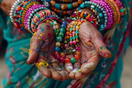 Artisan hands present a kaleidoscope of Holi-inspired jewelry, capturing the essence of the festival in beads and baubles. Craft meets culture in vibrant harmony