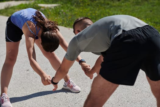 Exercise, mockup and couple workout and stretch together outdoors in nature by a mountain for health, wellness and fitness. People, partners and athletes training and keeping fit and heathy.