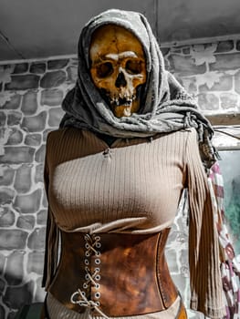 Female skeleton mannequin in stalker clothes