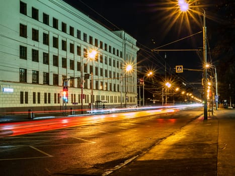 tram in a blurry form in the night city center , Moscow, Russia