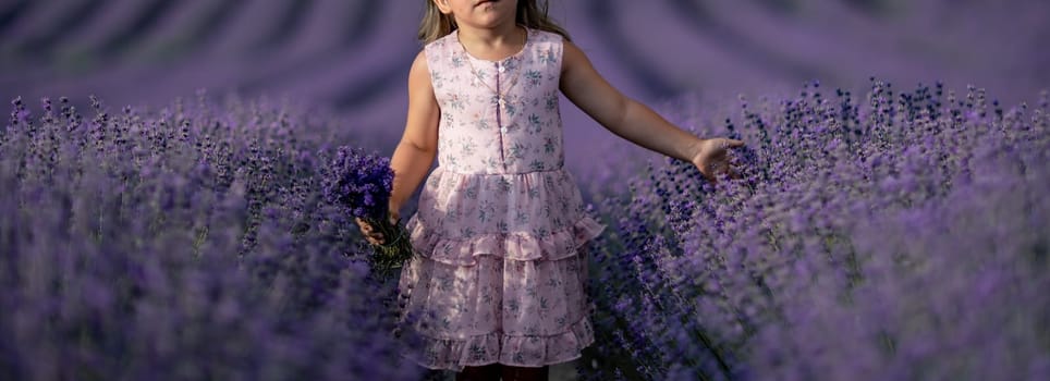 Lavender field girl. happy girl in pink dress in a lilac field of lavender. Aromatherapy concept, lavender oil, photo session in lavender.