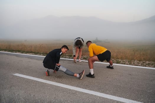 A vibrant and diverse group of athletes engage in stretching and warming up exercises, showcasing their unity and readiness for an invigorating morning run.