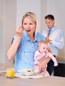 Woman, breakfast and thinking with baby in morning for daily routine, planning and eating in kitchen. Mother, infant and standing in house with vision, ideas and nurture of child in family home.
