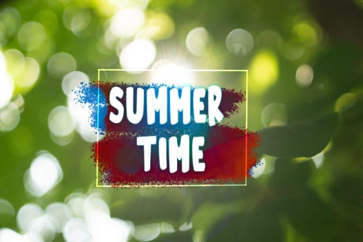 Summer Time are artistically displayed as a colorful, motivational greeting against a backdrop of soft focus green leaves, invoking the warmth and joy of the summer season.