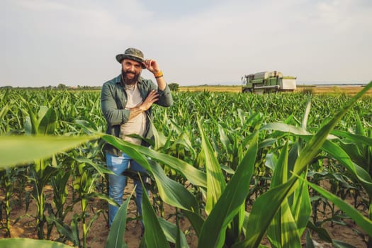 Portrait of farmer who is cultivating corn. Agricultural occupation.