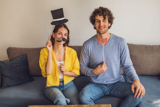 Portrait of young happy couple at home. They are having fun.