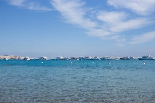 Beach Relaxation at the Red Sea. Fairy-tale Moments of a Sunny Day. The concept of tourism and sea travel.