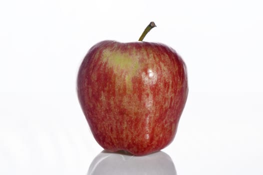 appetizing juicy red apple on a white background studio shooting