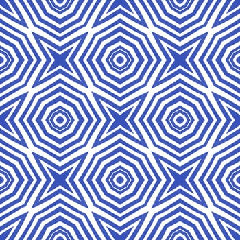 Geometric seamless pattern. Indigo symmetrical kaleidoscope background. Hand drawn geometric seamless design. Textile ready pleasing print, swimwear fabric, wallpaper, wrapping.