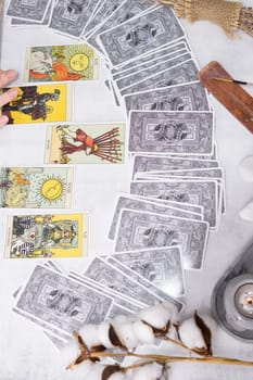 TVER, RUSSIA - FEBRUARY 18, 2024. Tarot cards, Tarot card divination, fortune telling. Occultism, esoteric education