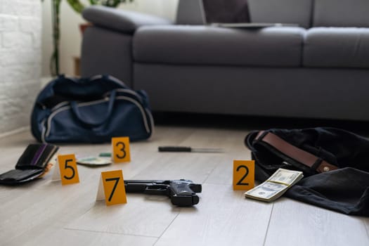 Flat lay composition with evidences and crime scene markers on wooden background. High quality photo