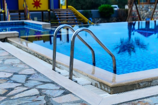 handrails ladder in a swimming pool in a residential complex 1