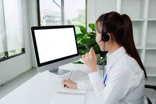 Customer service, woman and happy call center agent giving advice online using a headset. blank white screen computer.