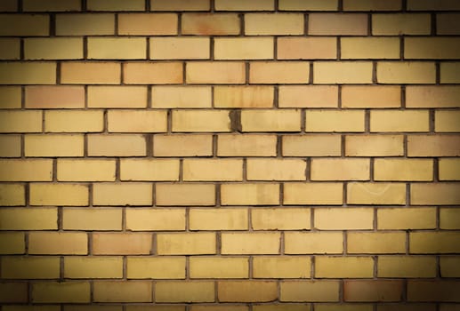 Close up of a yellow brick wall background