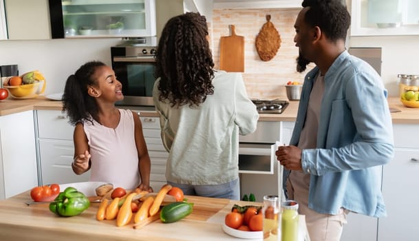 Happy family with father, mother and daughter in the kitchen, happy mom, dad and child with attachment and relationship, lifestyle and nutrition concept. High quality image