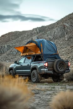 An SUV with a tent on the roof in the wild. Traveling by car.
