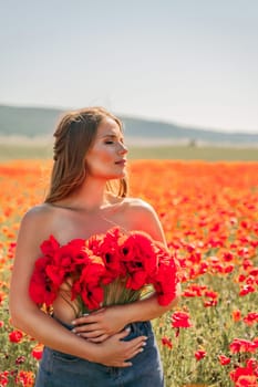 Woman poppies field. portrait of a happy woman with long hair in a poppy field and enjoying the beauty of nature in a warm summer day