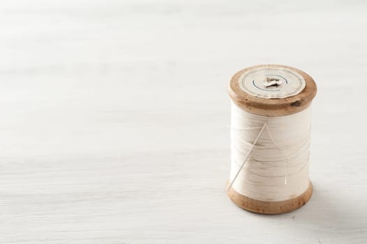 closeup thread for sewing and needlework, old reel of thread