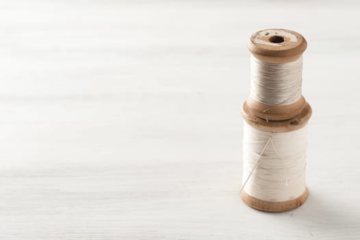 closeup thread for sewing and needlework, old reel of thread