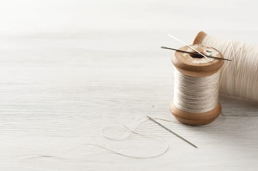 closeup thread for sewing and needlework, old reel of thread