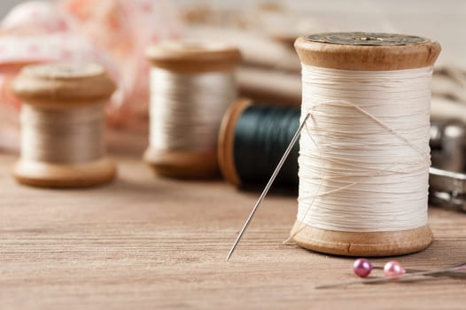 closeup thread for sewing and needlework, old reel of thread