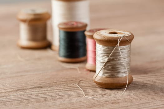 closeup thread for sewing and needlework, old reel of thread