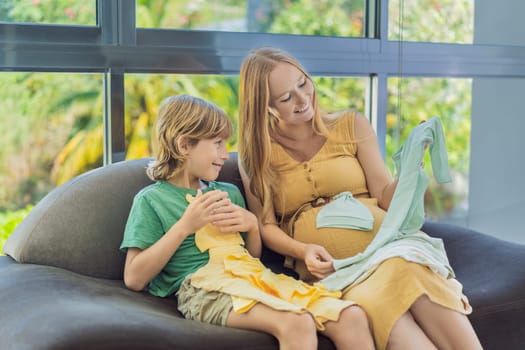 Heartwarming family moment as expectant mom and son joyfully browse through newborn baby's clothes, eagerly anticipating the arrival of a new family member.