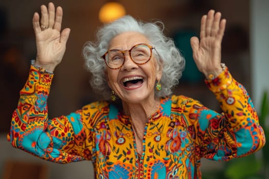 Happy and playful elderly woman in colored clothes indoors.