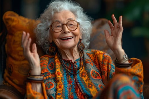 Happy and playful elderly woman in colored clothes indoors.