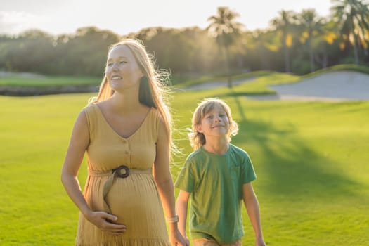 Heartwarming outdoor bonding as a pregnant mom and her son enjoy quality time together, savoring the beauty of nature and creating cherished moments.